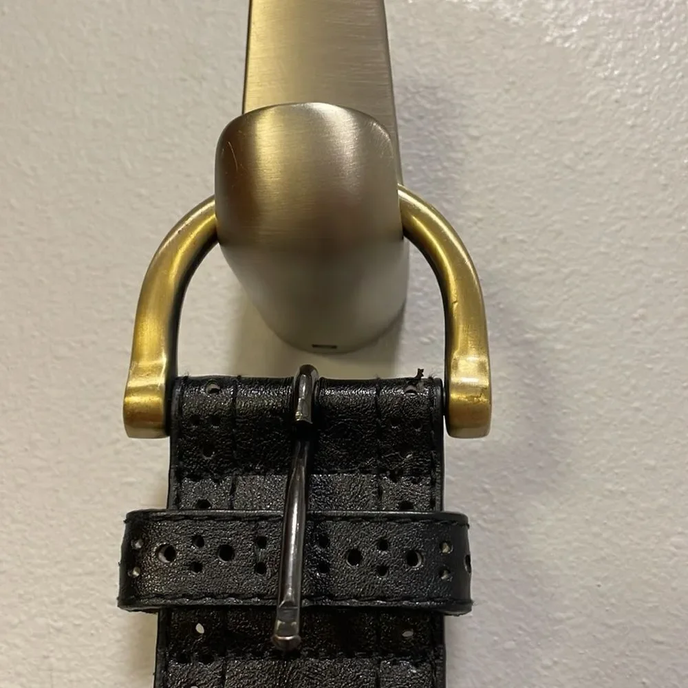 Woman’s black leather belt